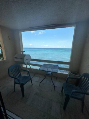 Escape to Serenity by the Sea! Beachfront Apartment with Pool, Just 5 Minutes from the Ferry